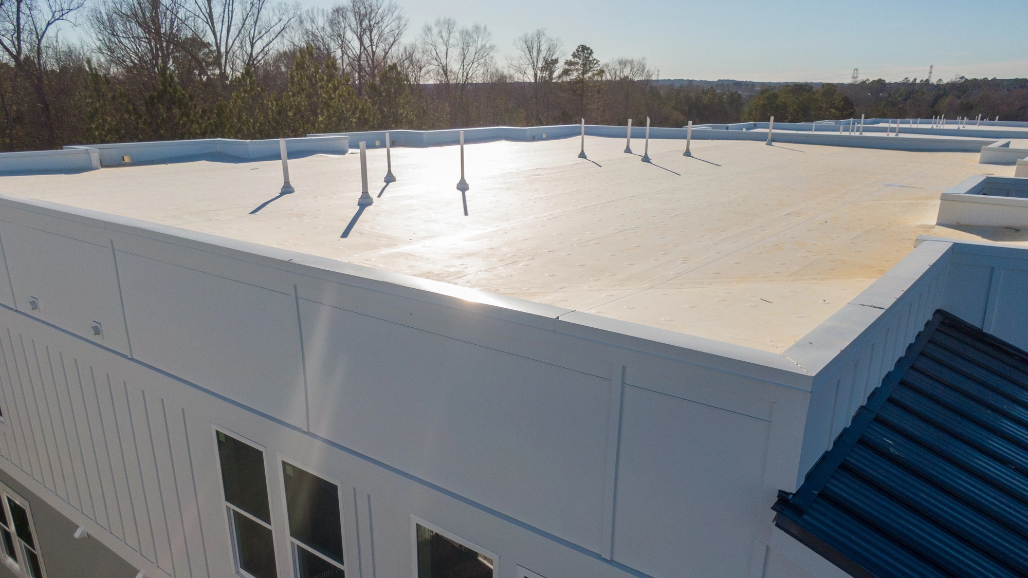 A brand-new flat roofing system on a commercial building