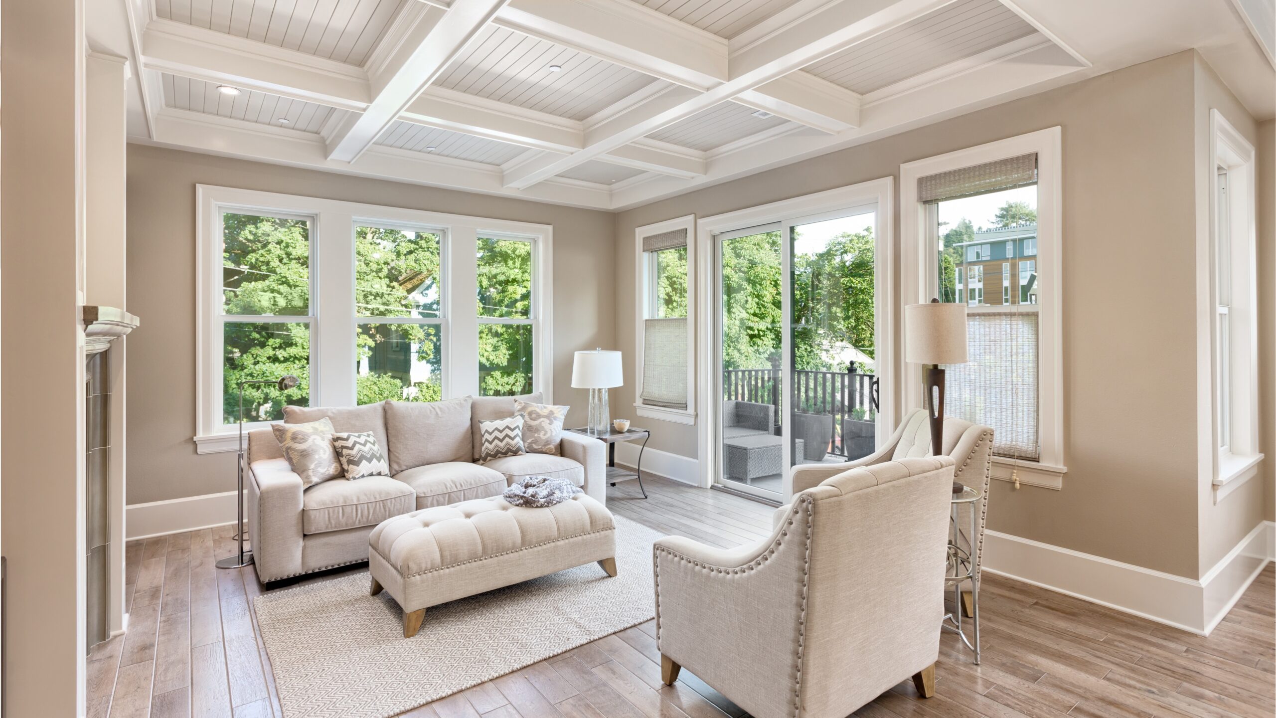 The interior of a home with new windows overlooking the trees