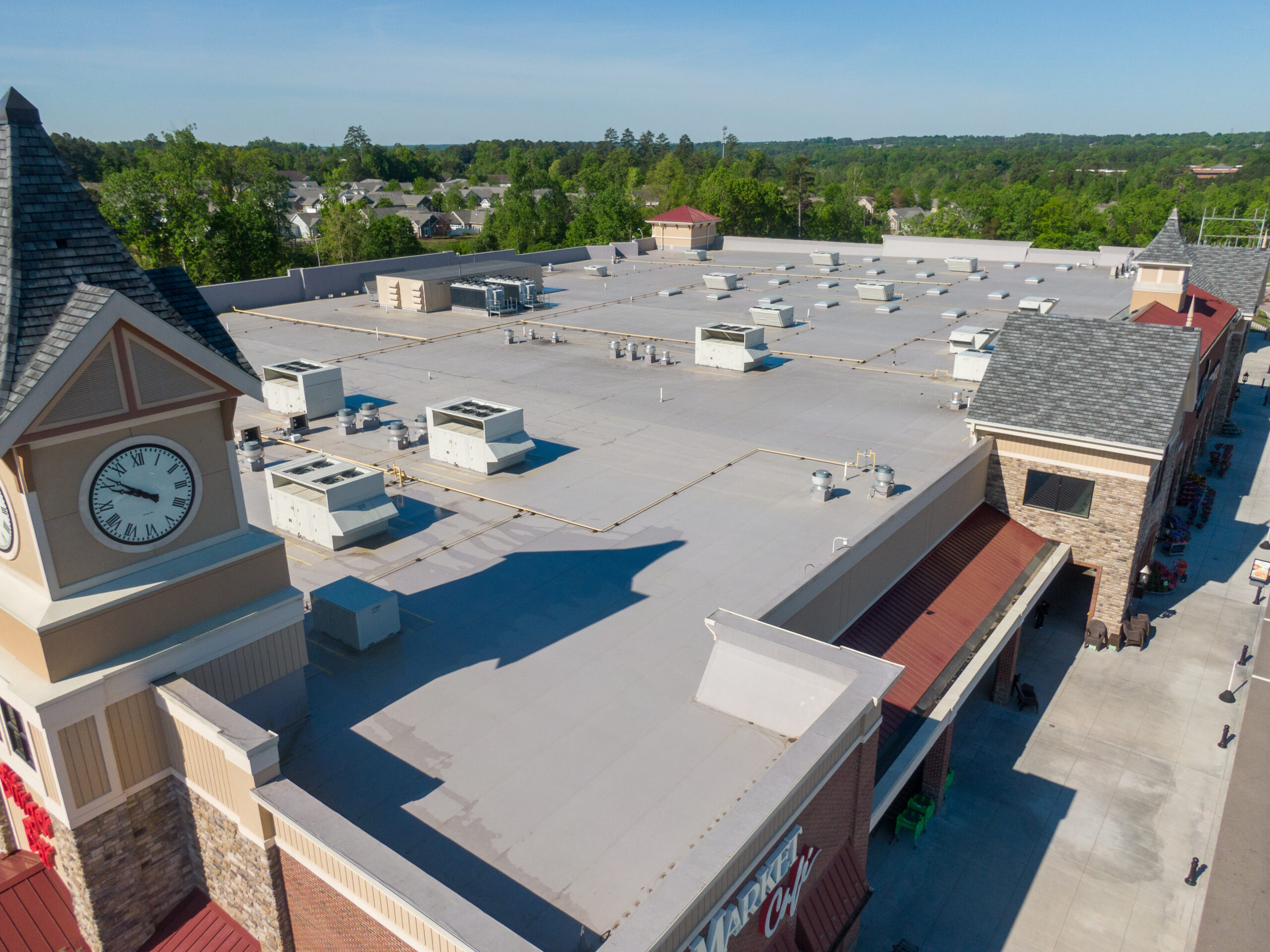 Aerial view of TPO flat roof of commercial shopping center