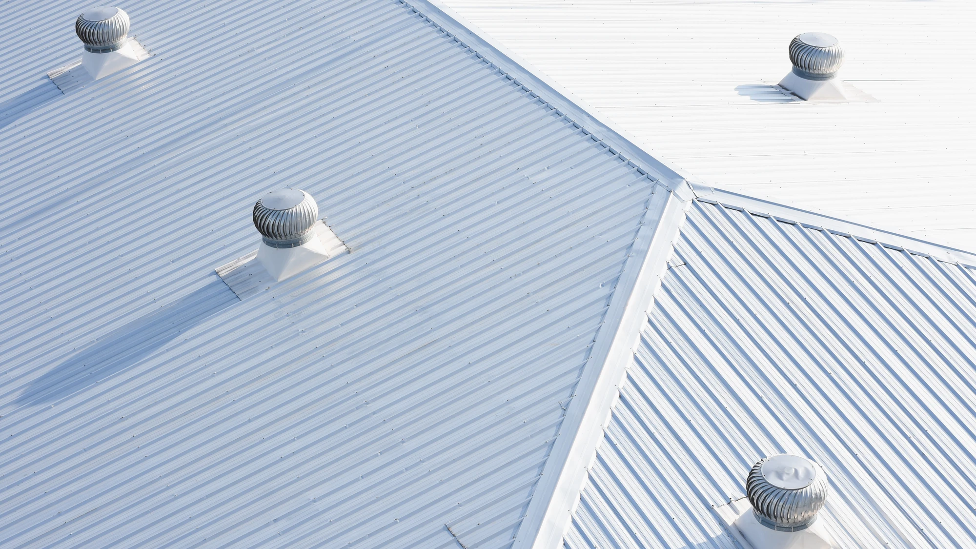 Aerial view of white metal roof